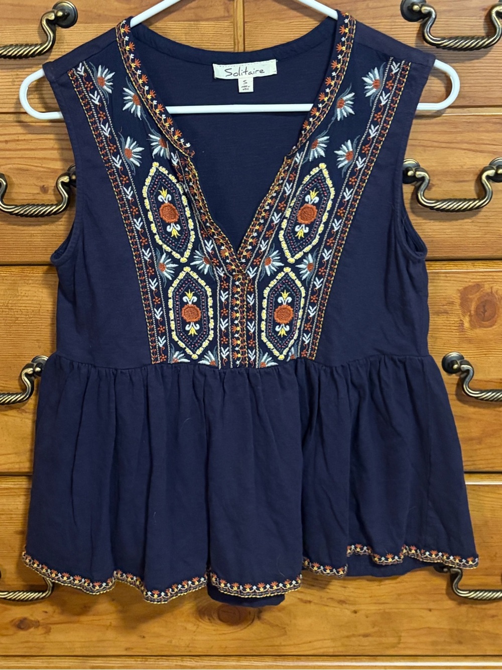 Solitaire Navy Sleeveless Embroidered V-Neck Peplum Camisole